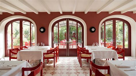 Ferrari and Massimo Bottura Reopen Ristorante Cavallino in Italy.